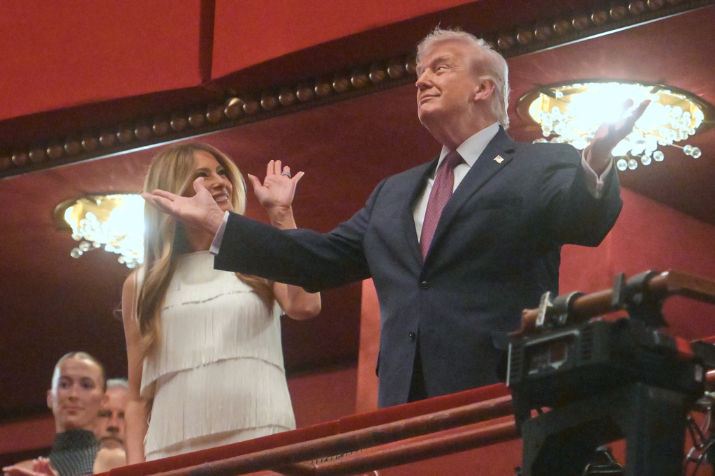 President Donald Trump and first lady Melania Trump arrive to attend the opening nights of the musical "Chicago" at the John F. Kennedy Center for the Performing Arts in Washington, Tuesday, March 31, 2026. (AP Photo/Rod Lamkey, Jr.)