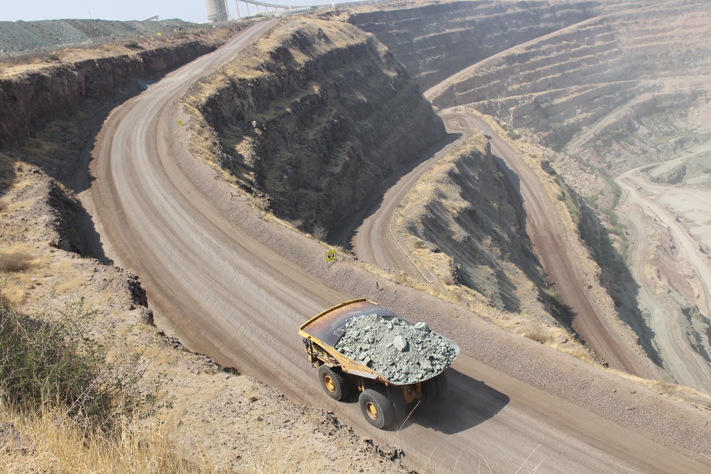 A truck carries rough stones from the Orapa open cast mine in Lethakane, Botswana, Sept. 14, 2025. (AP Photo/Sello Motseta)