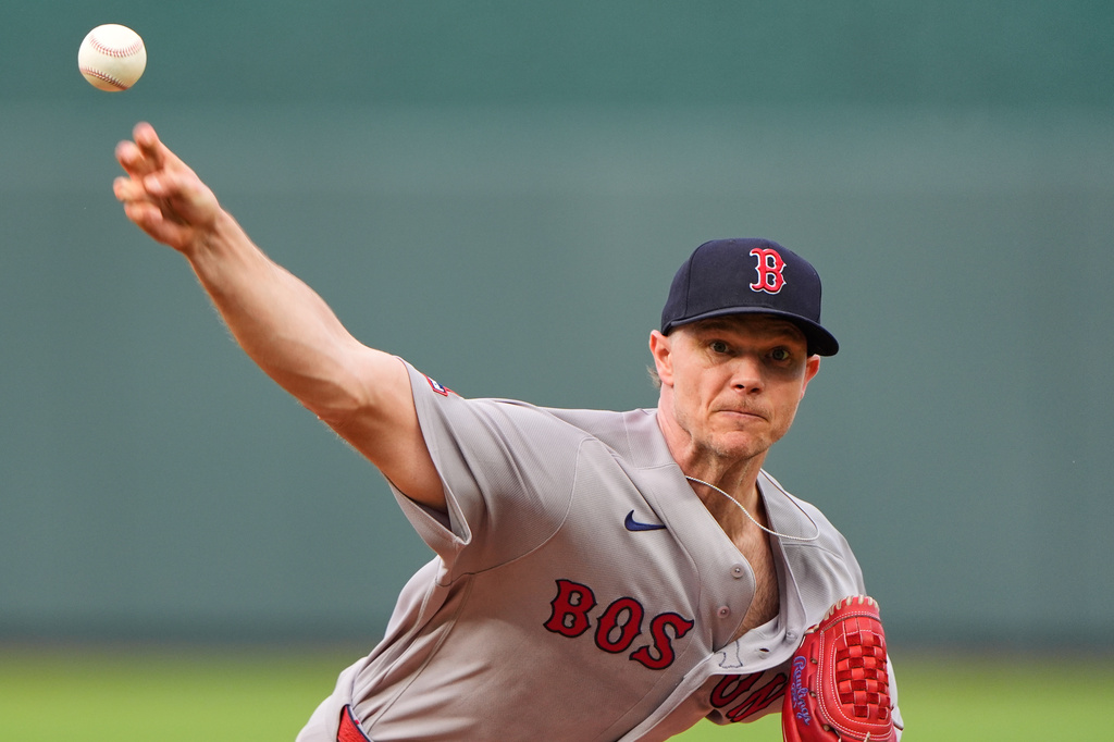 Boston Red Sox starting pitcher Sonny Gray throws during the first inning of a baseball game against the Kansas City Royals, Monday, May 18, 2026, in Kansas City, Mo. (AP Photo/Charlie Riedel)