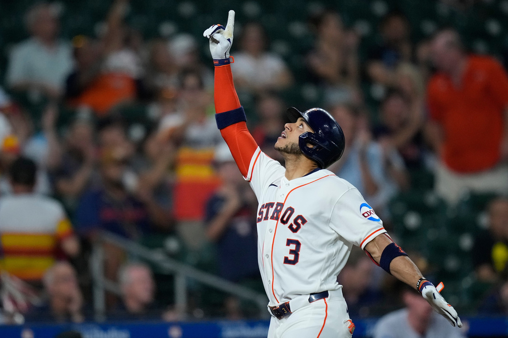 Houston Astros' Jeremy Peña celebrates after hitting a solo home run during the third inning of a baseball game against the Miami Marlins, Wednesday, July 22, 2026, in Houston. (AP Photo/Kevin M. Cox)