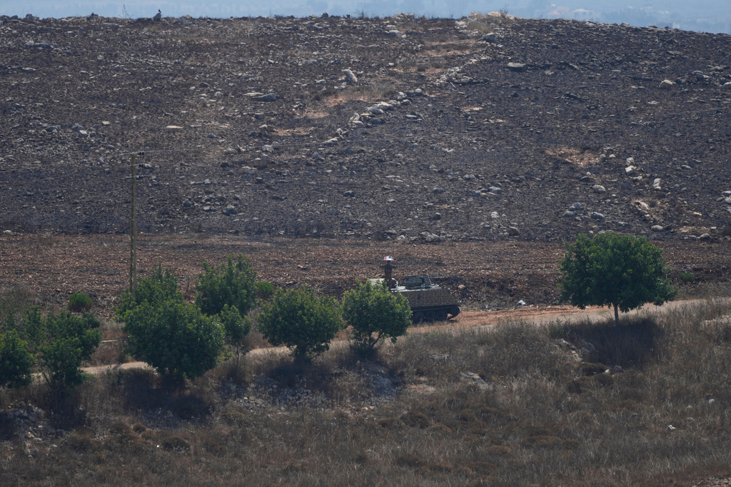 A Lebanese army armored personnel carrier deploys at the entrance to the southern village of Zawtar Al Gharbieh, Lebanon, Wednesday, July 22, 2026. (AP Photo/Mohammed Zaatari)