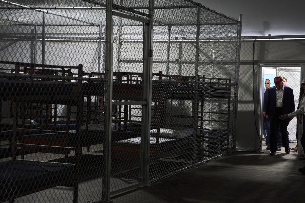FILE - President Donald Trump tours "Alligator Alcatraz," a new migrant detention facility at Dade-Collier Training and Transition facility, on July 1, 2025, in Ochopee, Fla. (AP Photo/Evan Vucci, File)