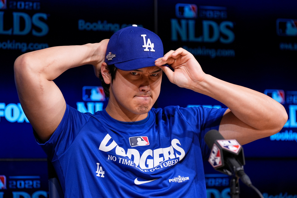 Los Angeles Dodgers' Shohei Ohtani speaks during a news conference ahead of a baseball NL Division Series Friday, Oct. 2, 2026, in Los Angeles. (AP Photo/Mark J. Terrill)