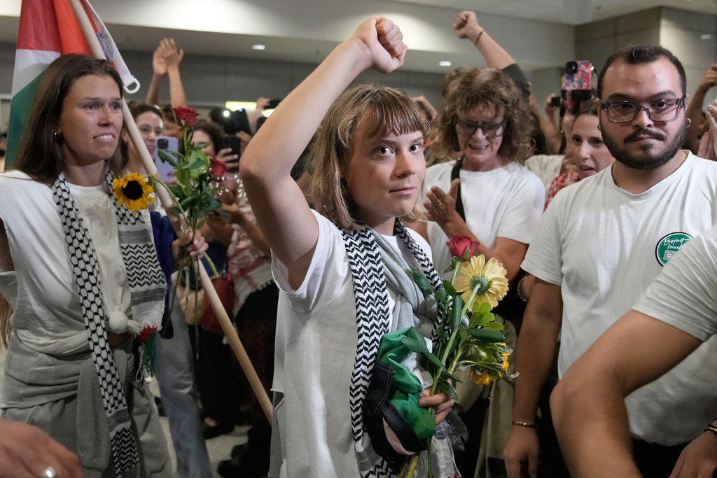 Swedish activist Greta Thunberg arrives at the Eleftherios Venizelos International Airport in Athens, Monday, Oct. 6, 2025 after being deported from Israel for taking part in a Gaza-bound aid flotilla. (AP Photo/Petros Giannakouris)
