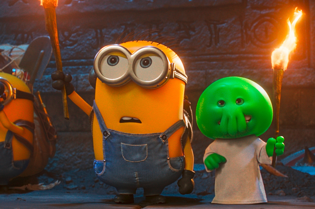 This image released by Universal Pictures shows minion Henry, voiced by Pierre Coffin, left, and Goomi, voiced by Trey Parker, in a scene from Illumination's "Minions & Monsters." (Universal Pictures via AP)
