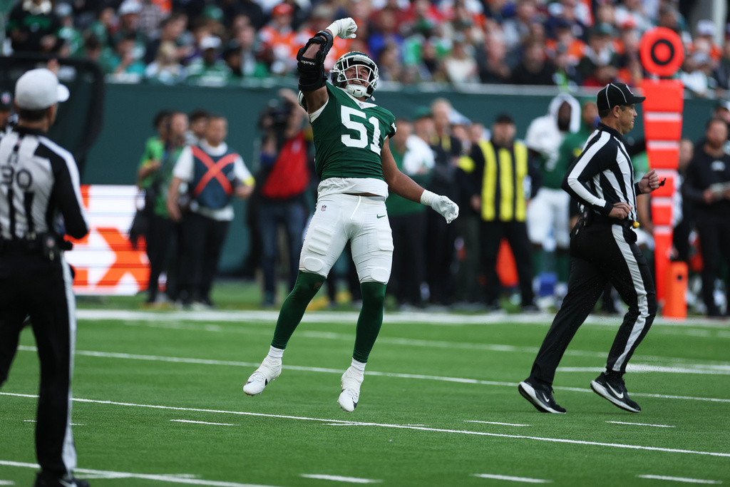 New York Jets linebacker Kiko Mauigoa reacts after the Denver Broncos were called for a safety in the second half of an NFL football game Sunday, Oct. 12, 20205, in London. (AP Photo/Ian Walton)