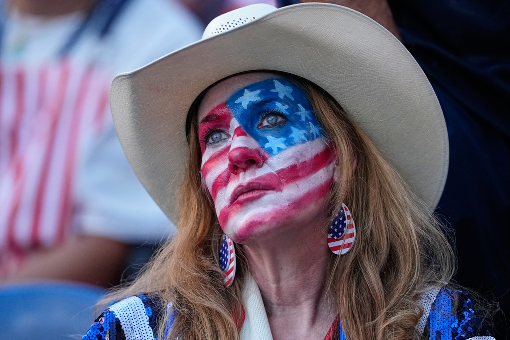 A United States fan reacts following the World Cup round of 16 soccer match between the United States and Belgium in Seattle, Monday, July 6, 2026. (AP Photo/Lindsey Wasson)