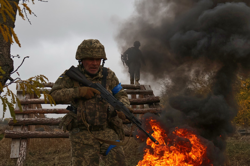 In this photo provided by Ukraine's 65th Mechanized Brigade press service, recruits attend drills at a training ground in the Zaporizhzhia region, Ukraine, Saturday, Oct. 11, 2025. (Andriy Andriyenko/Ukraine's 65th Mechanized Brigade via AP) In this photo provided by Ukraine's 65th Mechanized Brigade press service, recruits attend drills at a training ground in the Zaporizhzhia region, Ukraine, Saturday, Oct. 11, 2025. (Andriy Andriyenko/Ukraine's 65th Mechanized Brigade via AP)