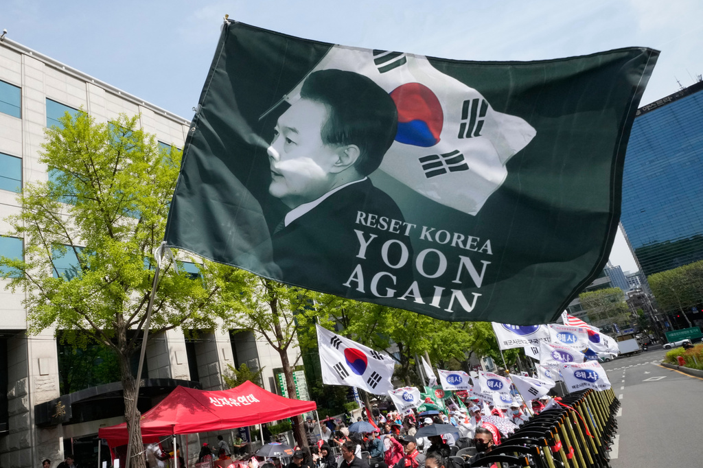 Supporters of former South Korean President Yoon Suk Yeol stage a rally outside of the Seoul High Court in Seoul, South Korea, Wednesday, April 29, 2026. (AP Photo/Ahn Young-joon)