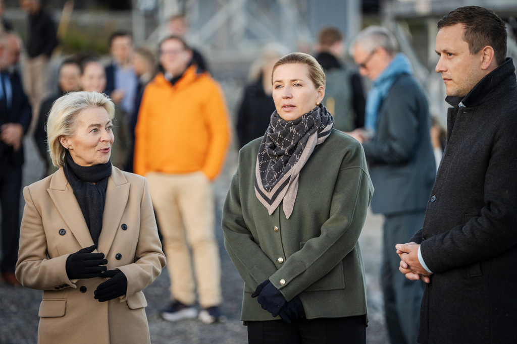 Denmark's Prime Minister Mette Frederiksen, center, President of the European Commission Ursula von der Leyen, left, and Greenland's Prime Minister Jens-Frederik Nielsen, visit the company Eutelsat OneWeb in Nuuk, Greenland, Monday, Sept. 7, 2026. (Mads Claus Rasmussen/Ritzau Scanpix via AP)