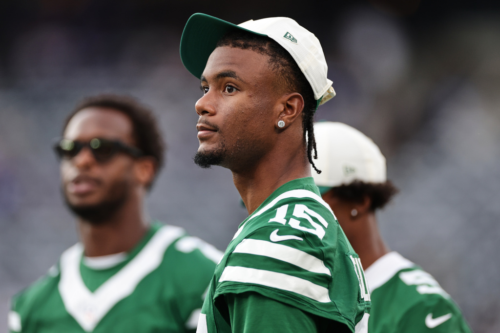 FILE - New York Jets wide receiver Adonai Mitchell (15) stands on the field before a preseason NFL football game against the New York Giants, Aug. 28, 2026, in East Rutherford, N.J. (AP Photo/Adam Hunger, File)
