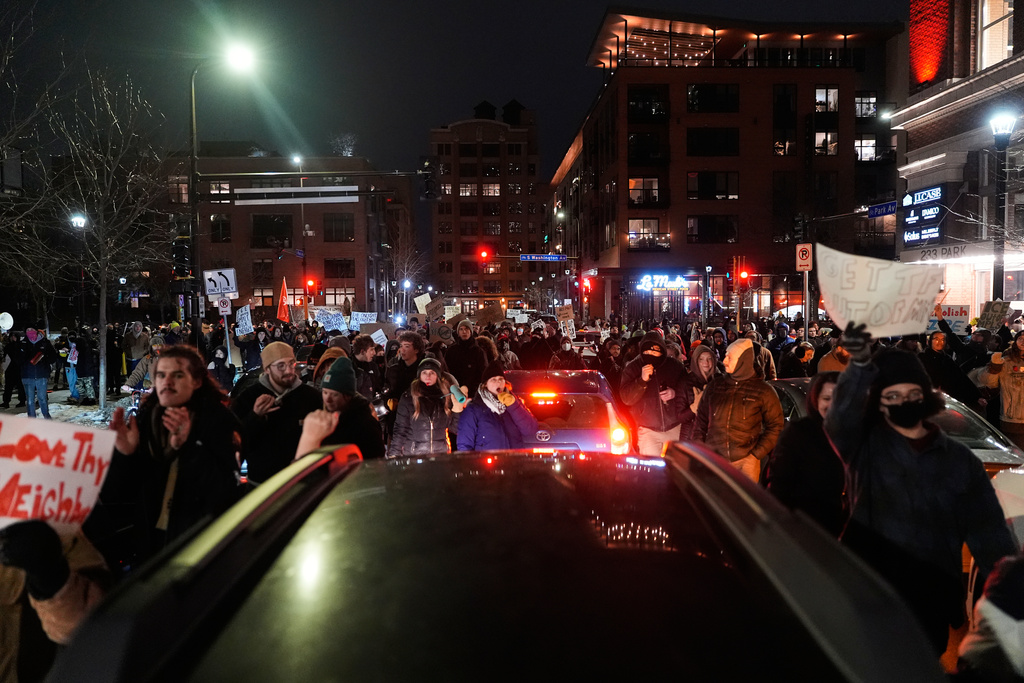 People participate in a protest and noise demonstration calling for an end to federal immigration enforcement operations in the city, Friday, Jan. 9, 2026, in Minneapolis. (AP Photo/Jen Golbeck)
