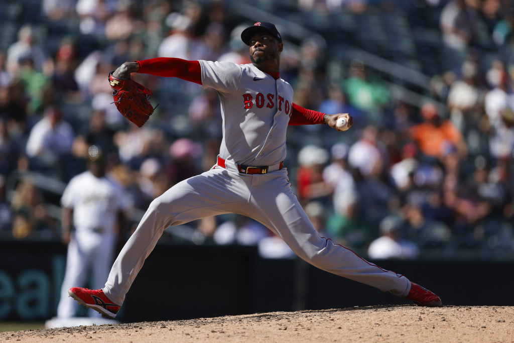 Boston Red Sox pitcher Aroldis Chapman throws to a Athletics batter during the ninth inning of a baseball game Wednesday, Sept. 10, 2025, in West Sacramento, Calif. (AP Photo/Sergio Estrada)