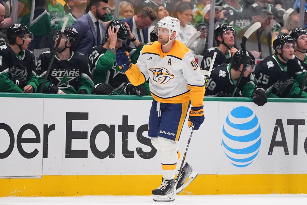 Nashville Predators center Steven Stamkos (91) skates past the Dallas Stars bench after scoring a goal during the first period of an NHL hockey game Saturday, Feb. 28, 2026, in Dallas. (AP Photo/LM Otero)