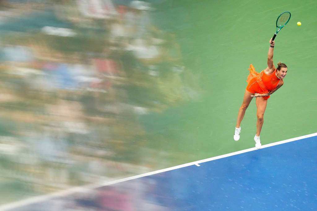 Aryna Sabalenka, of Belarus, serves the ball to Taylor Townsend, of the United States, during the fourth round of the U.S. Open tennis championships Sunday, Sept. 6, 2026, in New York. (AP Photo/Yuki Iwamura)