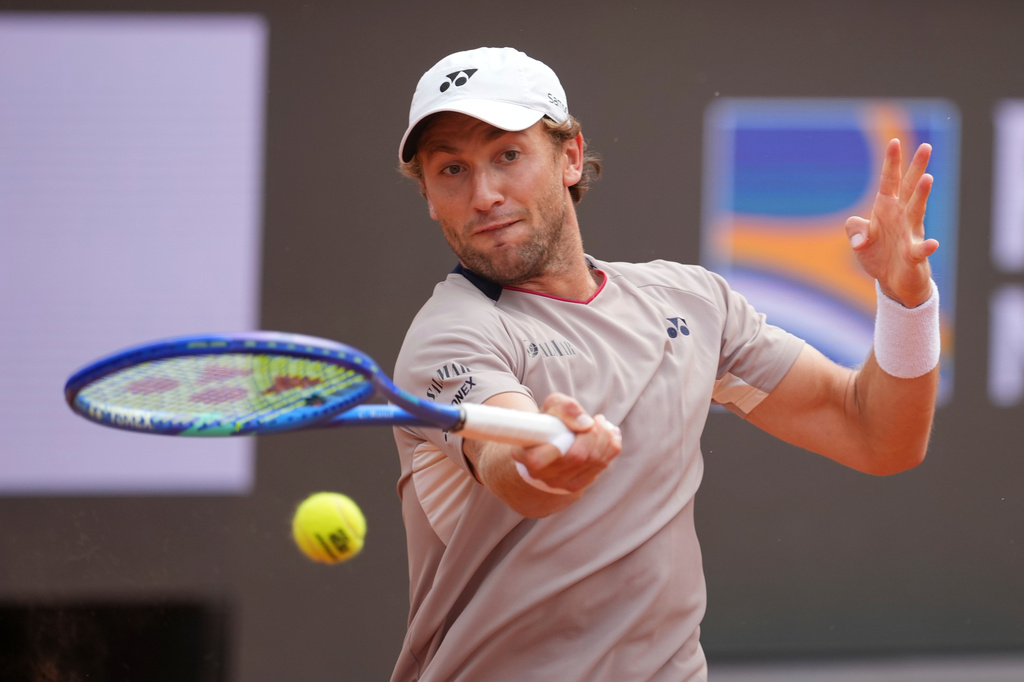 Casper Ruud of Norway returns a ball to Luciano Darderi of Italy during their semifinal match at the Italian Open tennis tournament in Rome, Friday, May 15, 2026. (AP Photo/Andrew Medichini)