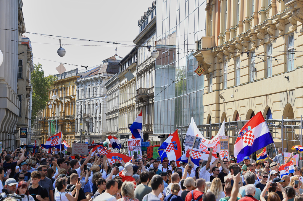 Thousands of people rally in protest over the discovery of illegally imported and disposed waste, including hazardous and toxic materials, in downtown Zagreb, Croatia, Saturday, Sept. 5, 2026. (AP Photo)
