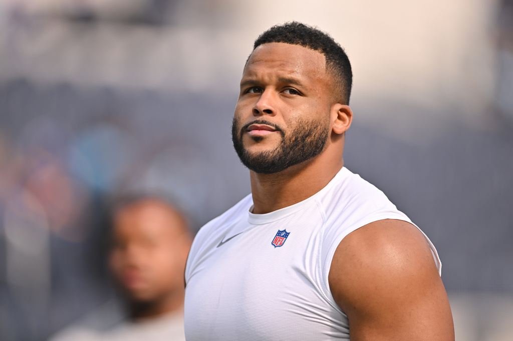 Los Angeles Rams defensive end Aaron Donald warms up before an NFL football game against the New York Giants in Inglewood, Calif., Monday, Sept. 21, 2026. (AP Photo/Katie Chin)