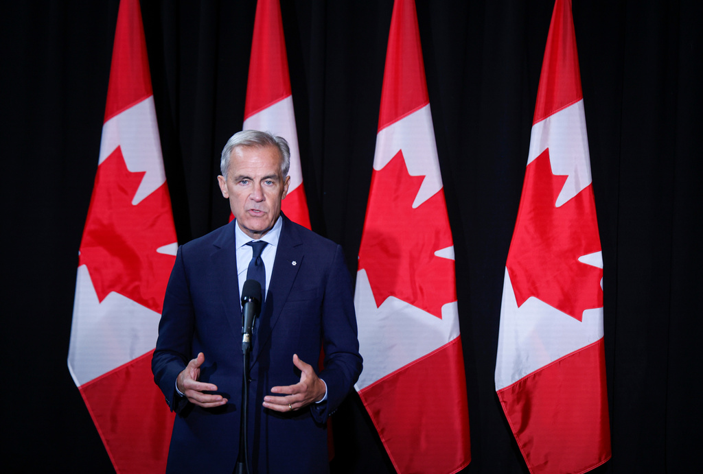 Canadian Prime Minister Mark Carney speaks to the media at a cabinet retreat in Banff, Alberta, Thursday, Sept. 10, 2026. (Jeff McIntosh/The Canadian Press via AP)