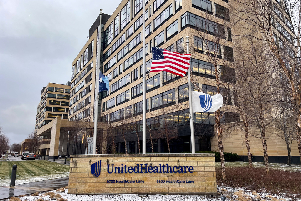 FILE - The UnitedHealthcare headquarters in Minnetonka, Minn., lowered its flags to half-staff on Dec. 4, 2024, in honor of CEO Brian Thompson, who was fatally shot outside a hotel in New York. (Kerem Yücel/Minnesota Public Radio via AP, File)