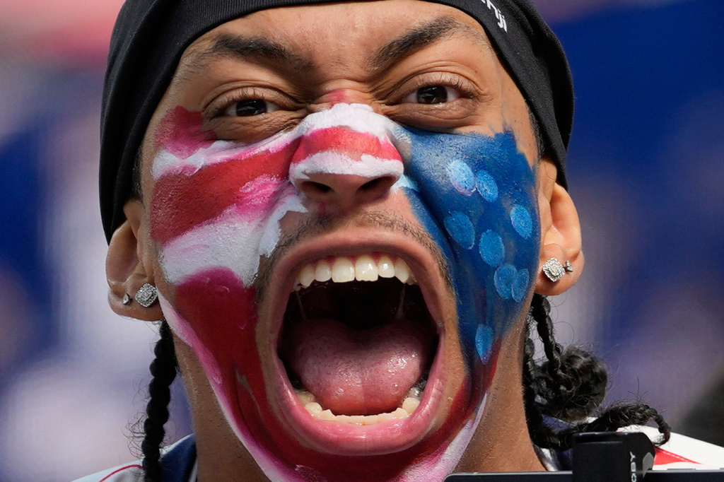 A United States fan cheers prior to the World Cup Group D soccer match between the United States and Paraguay in Inglewood, Calif., near Los Angeles, Friday, June 12, 2026. (AP Photo/Andre Penner)