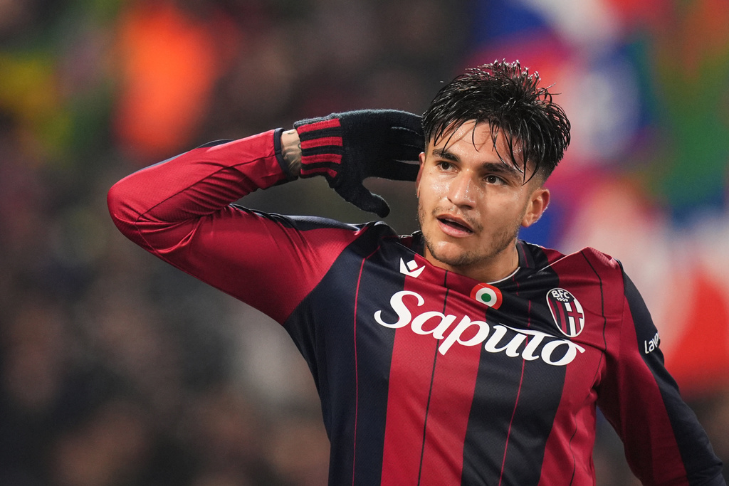 Bologna's Santiago Castro celebrates after scoring his side's second goal during the Italian Cup soccer match between Bologna and Parma in Bologna, Italy, Thursday, Dec. 4, 2025. (Massimo Paolone/LaPresse via AP)