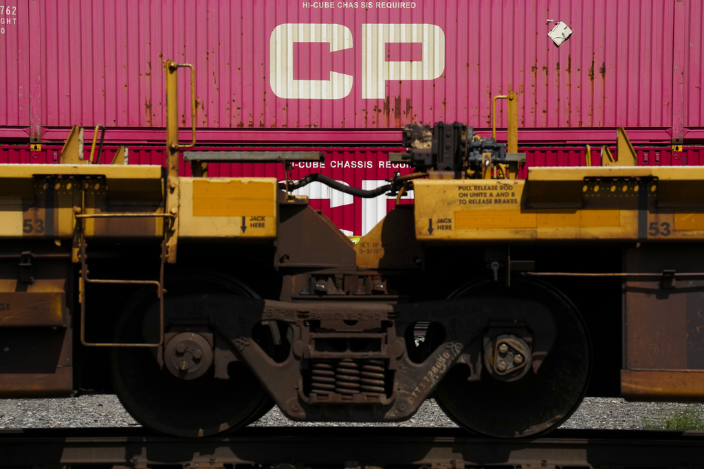 FILE - Trains sit idle at a Canadian Pacific Kansas City (CPKC) rail yard in Smiths Falls, Ontario, Canada, Aug. 22, 2024. (Sean Kilpatrick/The Canadian Press via AP, File)