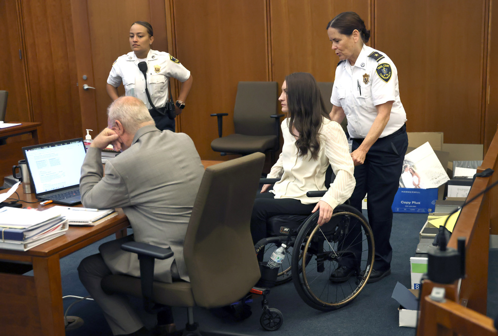 Lindsay Clancy enters the courtroom after a short break in her murder trial at Plymouth Superior Court in Plymouth, Mass., Wednesday, Aug. 5, 2026. (David L Ryan/The Boston Globe via AP, Pool) CORRECTION: Source is The Boston Globe, not The Boston Herald.