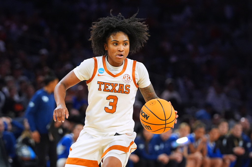 Texas guard Rori Harmon handles the ball in the second half in the Sweet 16 of the NCAA college basketball tournament against Kentucky, Saturday, March 28, 2026, in Fort Worth, Texas. (AP Photo/LM Otero)