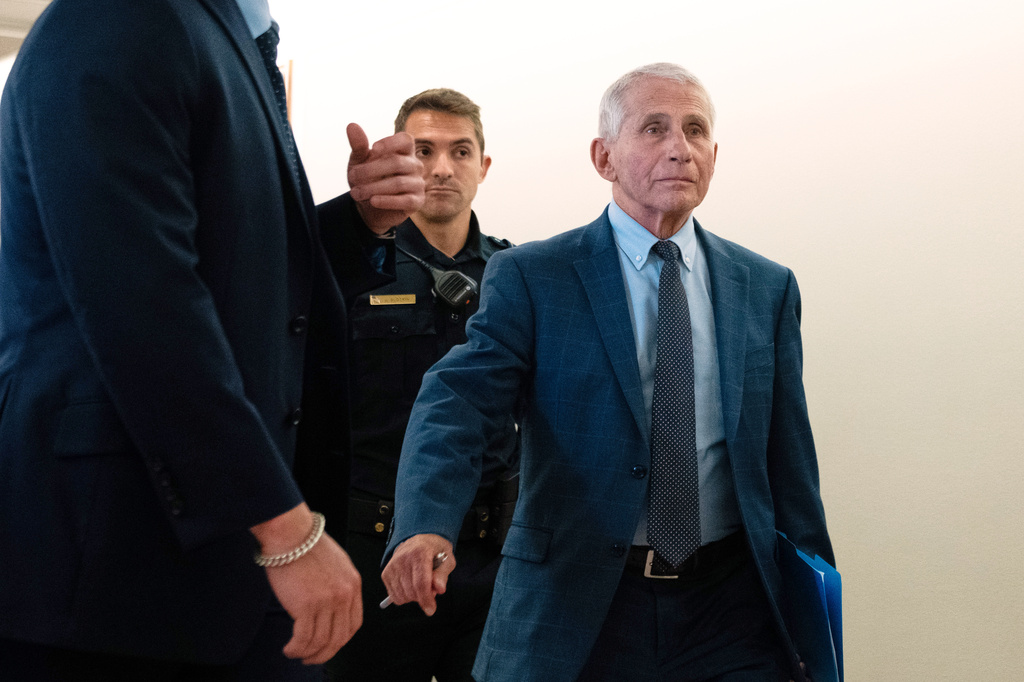 Dr. Anthony Fauci departs after appearing before the Senate Homeland Security and Governmental Affairs Committee hearing at the Capitol, Wednesday, July 29, 2026, in Washington. (AP Photo/Allison Robbert)