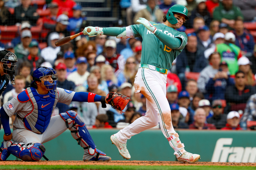 Boston Red Sox' Roman Anthony hits a triple during the seventh inning of the first baseball game of a doubleheader against the Chicago Cubs, Friday, Sept. 25, 2026, in Boston. (AP Photo/Greg M. Cooper)