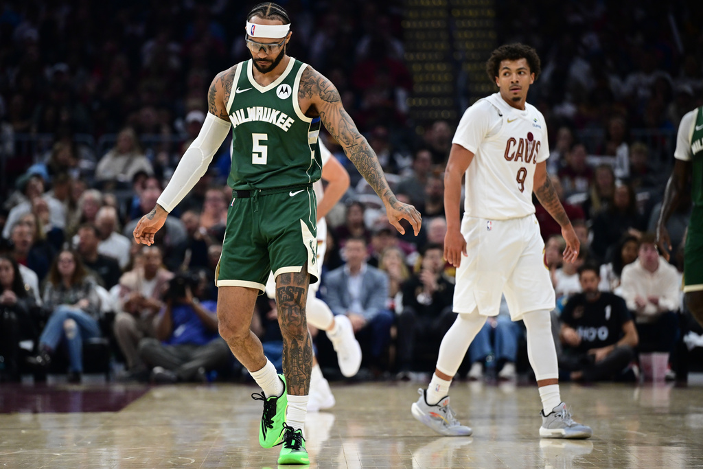 Milwaukee Bucks guard Gary Trent Jr. (5) reacts after a shot clock violation in the first half of an NBA basketball game against the Cleveland Cavaliers, Sunday, Oct. 26, 2025, in Cleveland. (AP Photo/David Dermer)