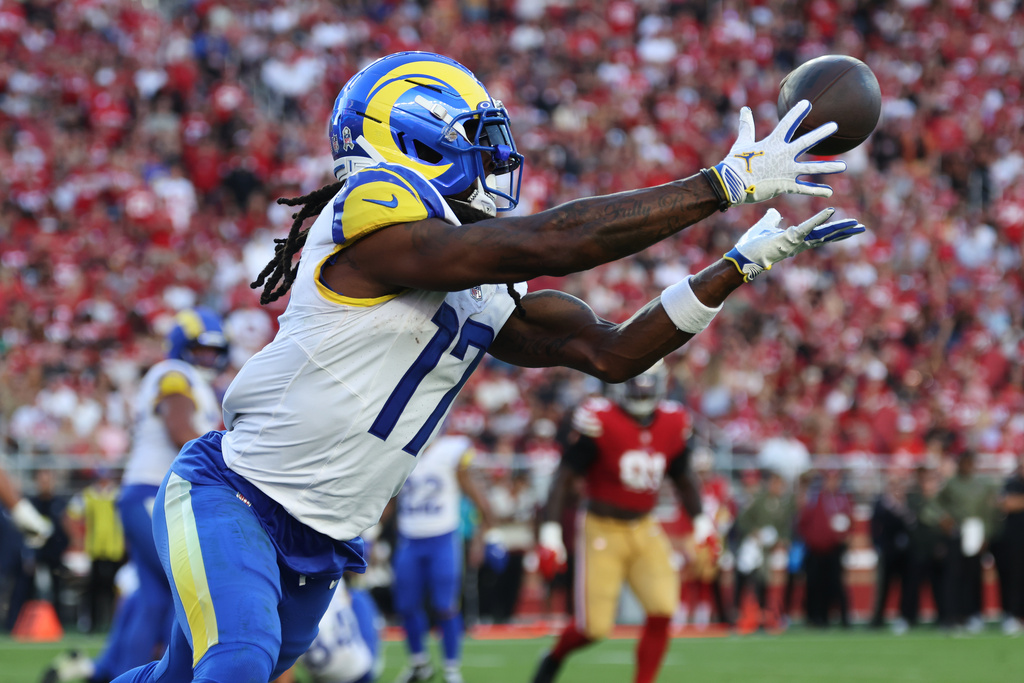 Los Angeles Rams wide receiver Davante Adams (17) catches a touchdown pass against the San Francisco 49ers during the second half of an NFL football game in Santa Clara, Calif., Sunday, Nov. 9, 2025. (AP Photo/Jed Jacobsohn)