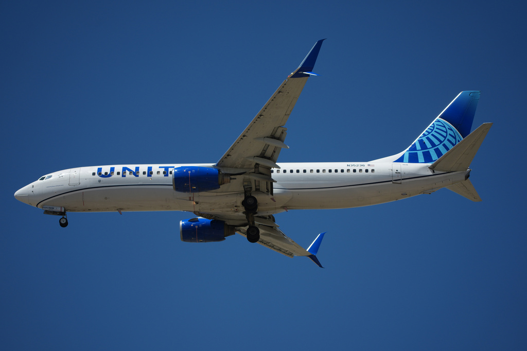 FILE - United Airlines jetliner prepares to land on a runway at Denver International Airport Monday, May 11, 2026, in Denver. (AP Photo/David Zalubowski, File)