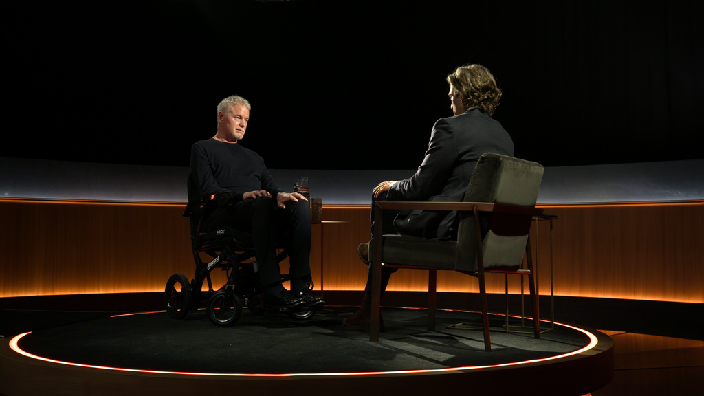 This image released by Netflix shows actor Eric Dane, left, and Brad Falchuk in an episode of, "Famous Last Words." (Netflix via AP)