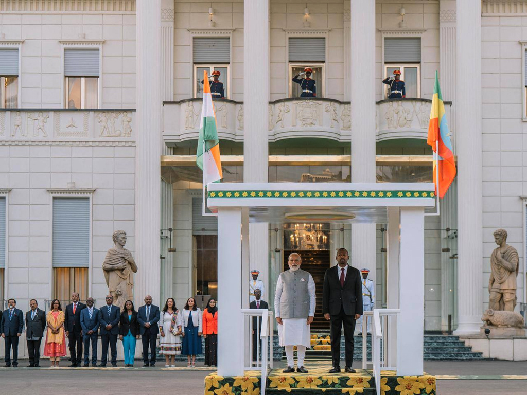 Indian Prime Minister Narendra Modi, left, and Ethiopian Prime Minister Abiy Ahmed Ali stand for the National Anthem at the Ethiopian National Palace in Addis Ababa, Ethiopia, Tuesday, Dec. 16, 2025. (Ethiopian Prime Minister's Office via AP)