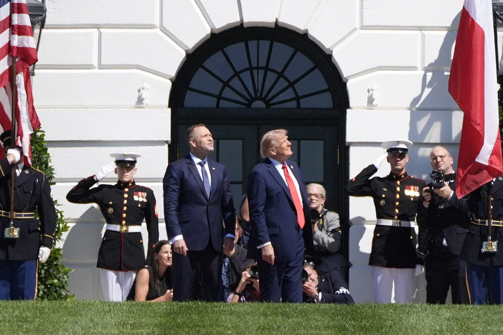 President Donald Trump, right, and Polish President Karol Nawrocki, left, watch a military aircraft flyover at the White House, Wednesday, Sept. 3, 2025, in Washington. (AP Photo/Alex Brandon)