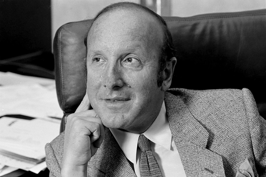 FILE - Record mogul Clive Davis is pictured in his New York office, Sept. 10, 1980. (AP Photo/Marty Reichenthal, File)