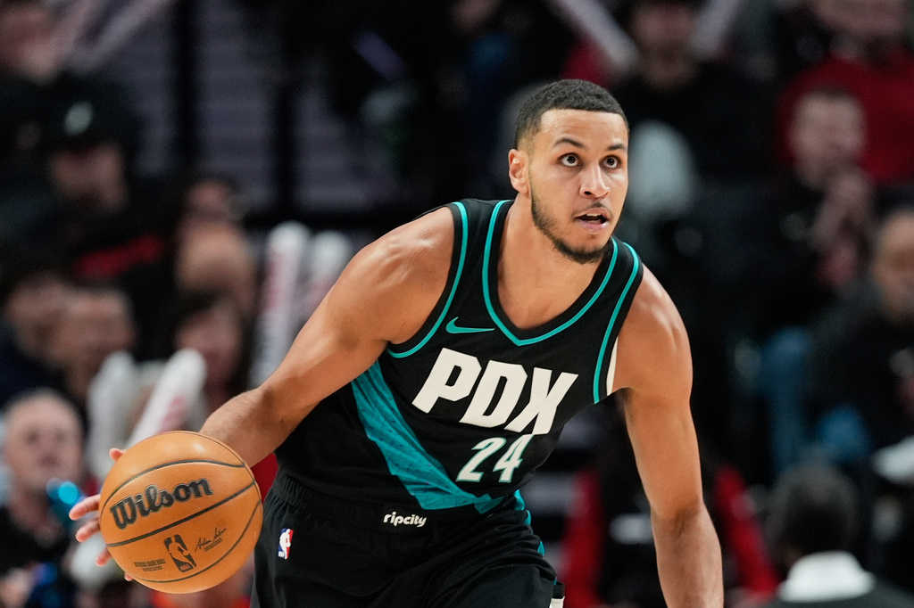 FILE - Portland Trail Blazers forward Kris Murray (24) dribbles down the court during the second half of an NBA basketball game against the New Orleans Pelicans, April 2, 2026, in Portland, Ore. (AP Photo/Jenny Kane, File)