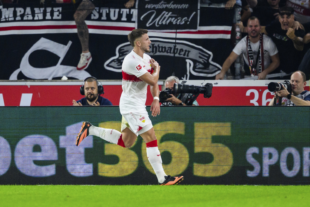 Stuttgart's Ermedin Demirovic celebrates scoring during the Bundesliga soccer match between VfB Stuttgart and FC St. Pauli, at MHPArena, Stuttgart, Germany, Friday Sept. 19, 2025. (Tom Weller/dpa via AP)