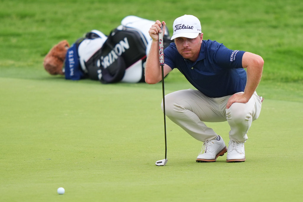 Ryan Gerard lines up a putt on the ninth hole during the first round of the Charles Schwab Challenge golf tournament at Colonial Country Club in Fort Worth, Texas, Thursday, May 28, 2026. (AP Photo/LM Otero)