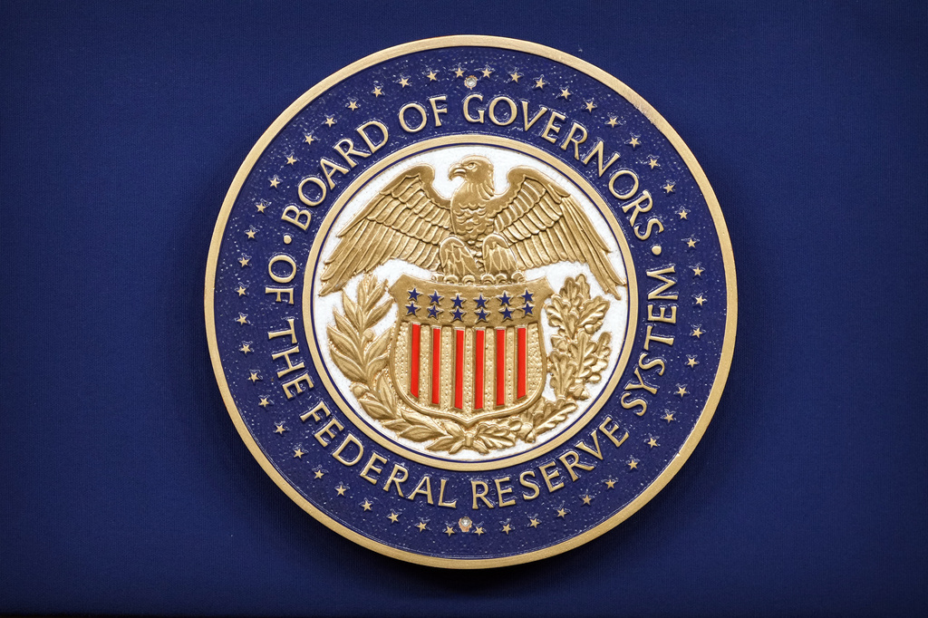 The logo of the Federal Reserve Board of Governors is seen before a news conference with Federal Reserve Board Chairman Kevin Warsh at the Federal Reserve in Washington, Wednesday, July 29, 2026. (AP Photo/Mark Schiefelbein)