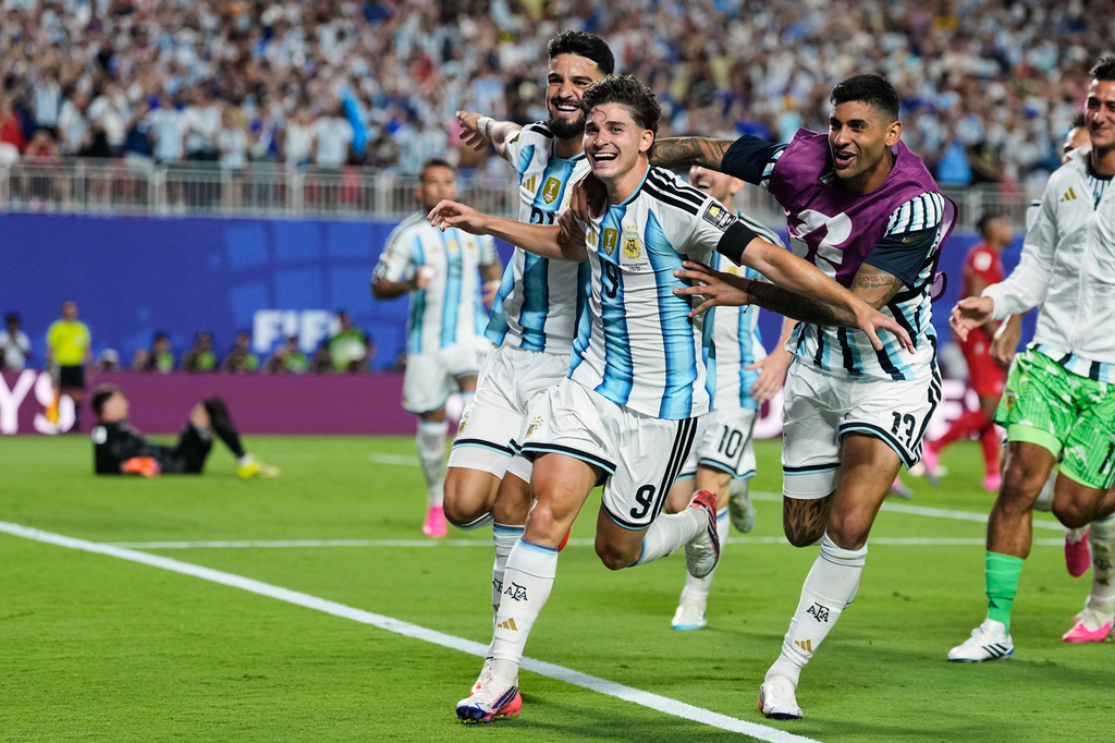 Argentina's Julian Alvarez (9) celebrates after scoring his side's second goal during the World Cup quarterfinal soccer match against Switzerland in Kansas City, Mo., Saturday, July 11, 2026. (AP Photo/Charlie Riedel)