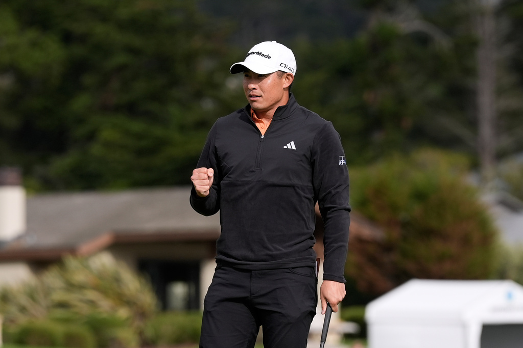 Collin Morikawa reacts after making a birdie putt on the 18th hole at Pebble Beach Golf Links during the final round of the AT&T Pebble Beach Pro-Am golf tournament in Pebble Beach, Calif., Sunday, Feb. 15, 2026. (AP Photo/Godofredo A. Vásquez)