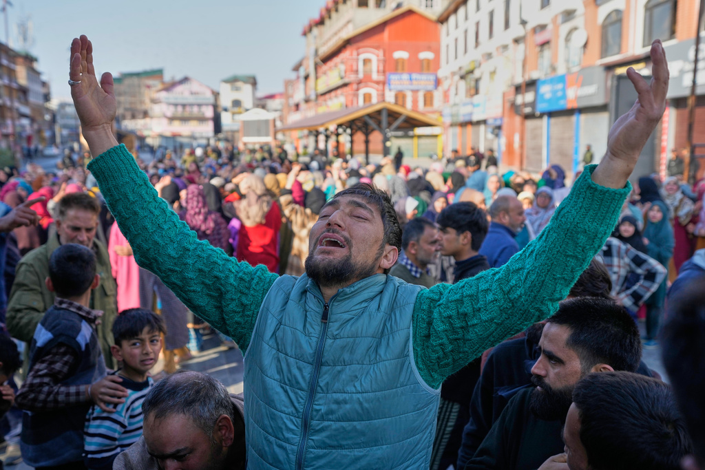 Shiite Muslims mourn the killing of Iranian Supreme Leader Ayatollah Ali Khamenei during a protest against the U.S. and Israel in Srinagar, Indian controlled Kashmir, Sunday, March 1, 2026. (AP Photo/Mukhtar Khan)