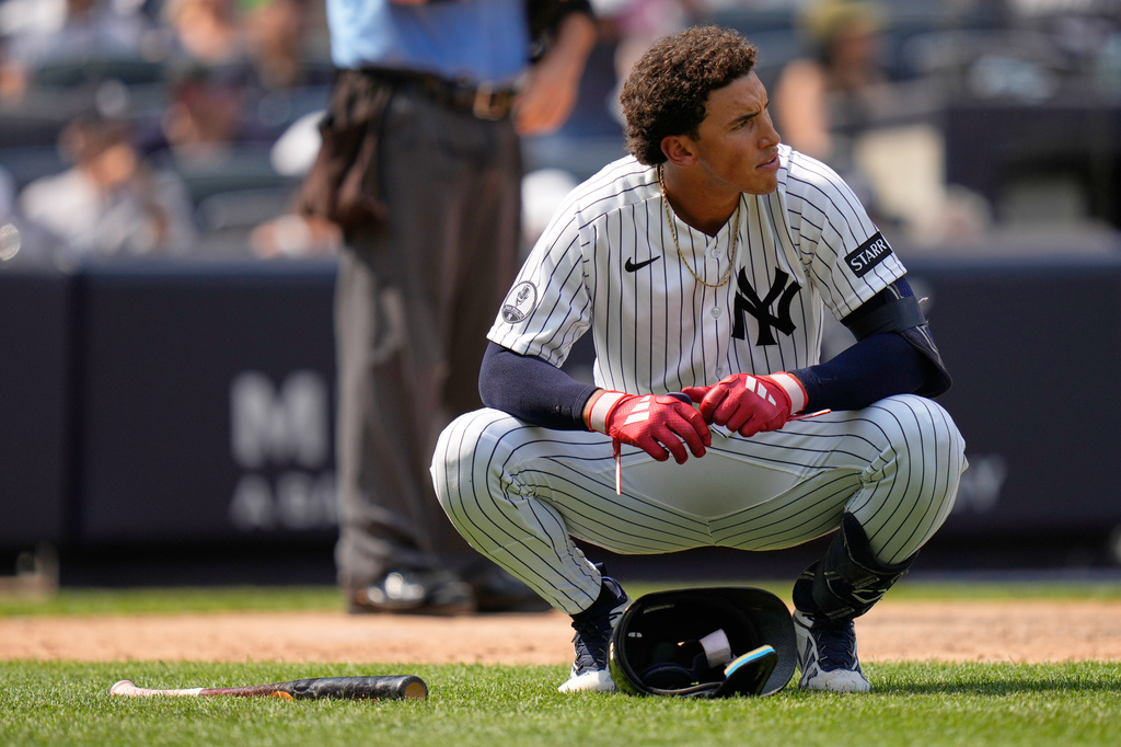 New York Yankees' George Lombard Jr. reacts after striking out swinging during the seventh inning of a baseball game against the Atlanta Braves, Sunday, Aug. 9, 2026, in New York. (AP Photo/Seth Wenig)