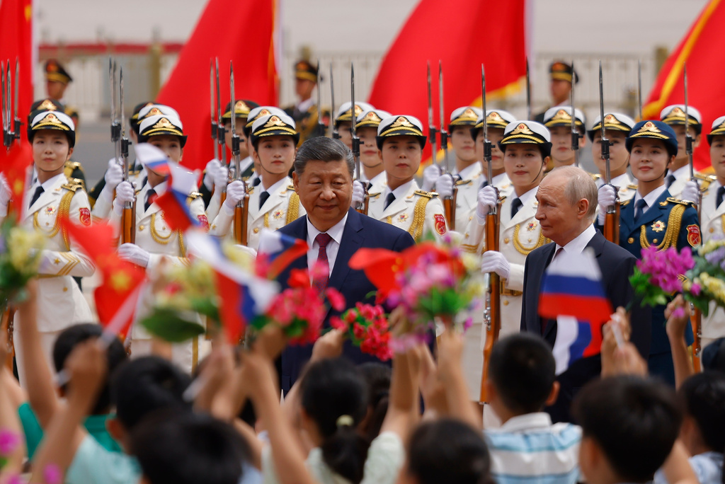 FILE - Russian President Vladimir Putin, right, and Chinese President Xi Jinping attend a welcoming ceremony at the Great Hall of the People in Beijing, May 20, 2026. (Maxim Shemetov/Pool Photo via AP, File)