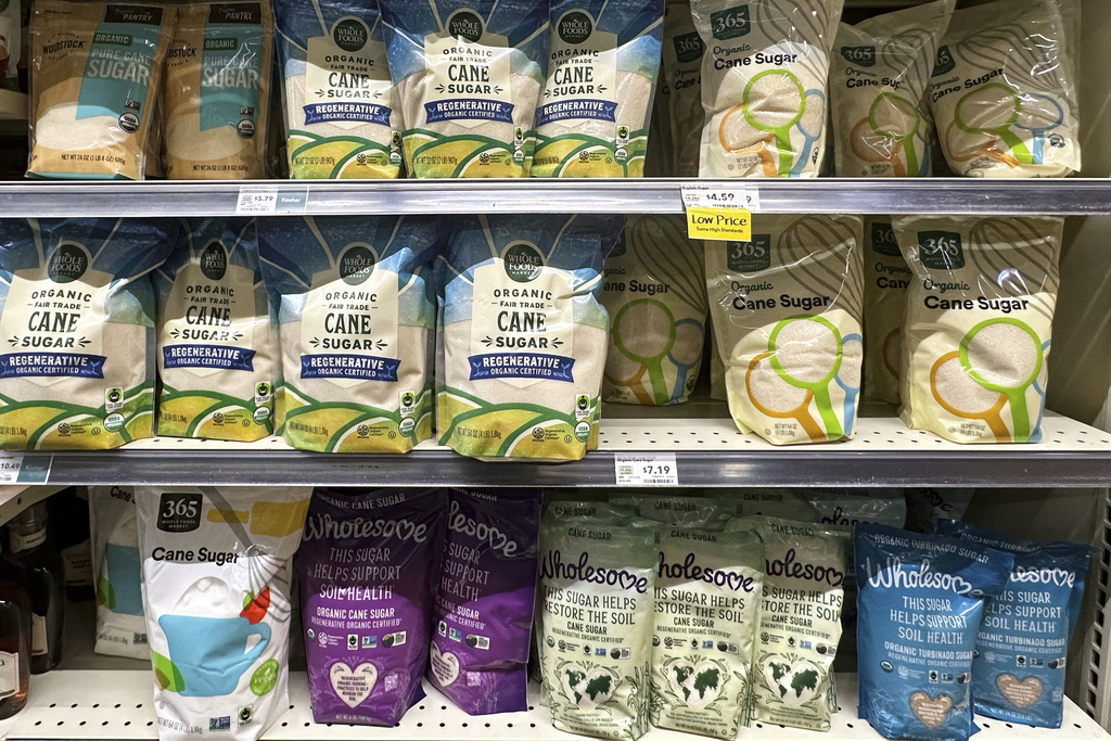 All different kinds of organic sugars are displayed on shelves at a grocery store in Northbrook, Ill., Wednesday, Sept. 17, 2025. (AP Photo/Nam Y. Huh)