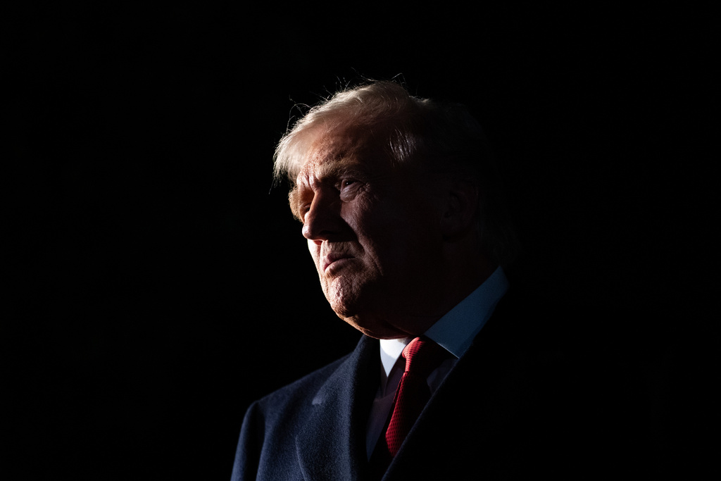 President Donald Trump talks to reporters as he departs the White House, Friday, Oct. 24, 2025, in Washington, for a trip to Asia. (AP Photo/Allison Robbert)