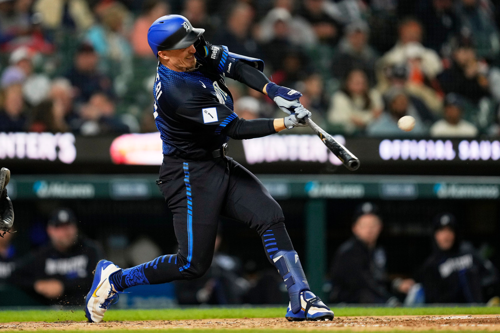 Detroit Tigers' Ben Malgeri hits a three-run home run against the Washington Nationals during the fifth inning of a baseball game Monday, Sept. 21, 2026, in Detroit. (AP Photo/Paul Sancya)
